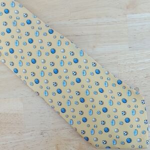 Salvatore Ferragamo Gold Tie with Blue and White Sports Pattern